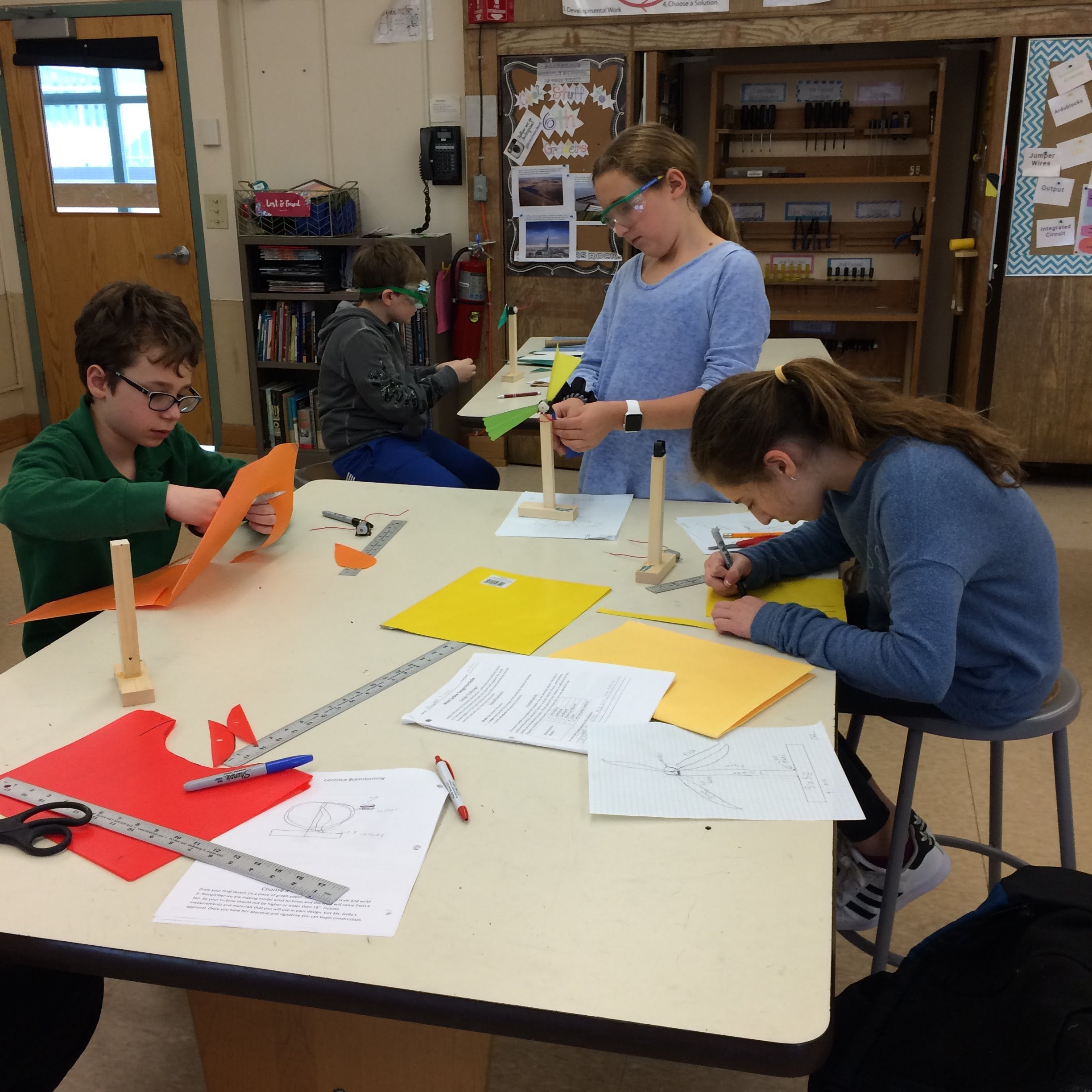 Students designing and building model wind turbines in class